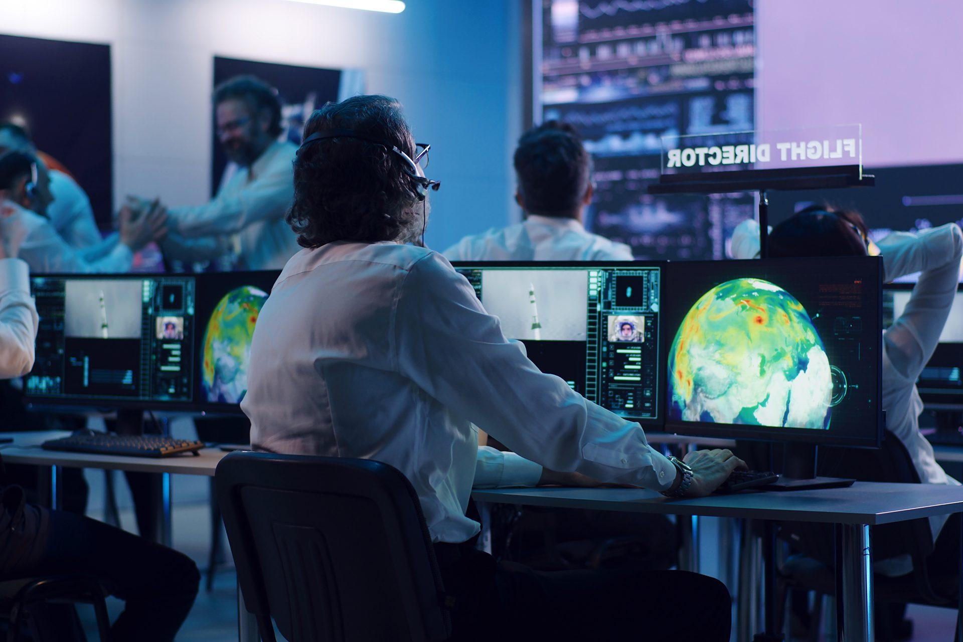 Flight director working in a Mission Control room.